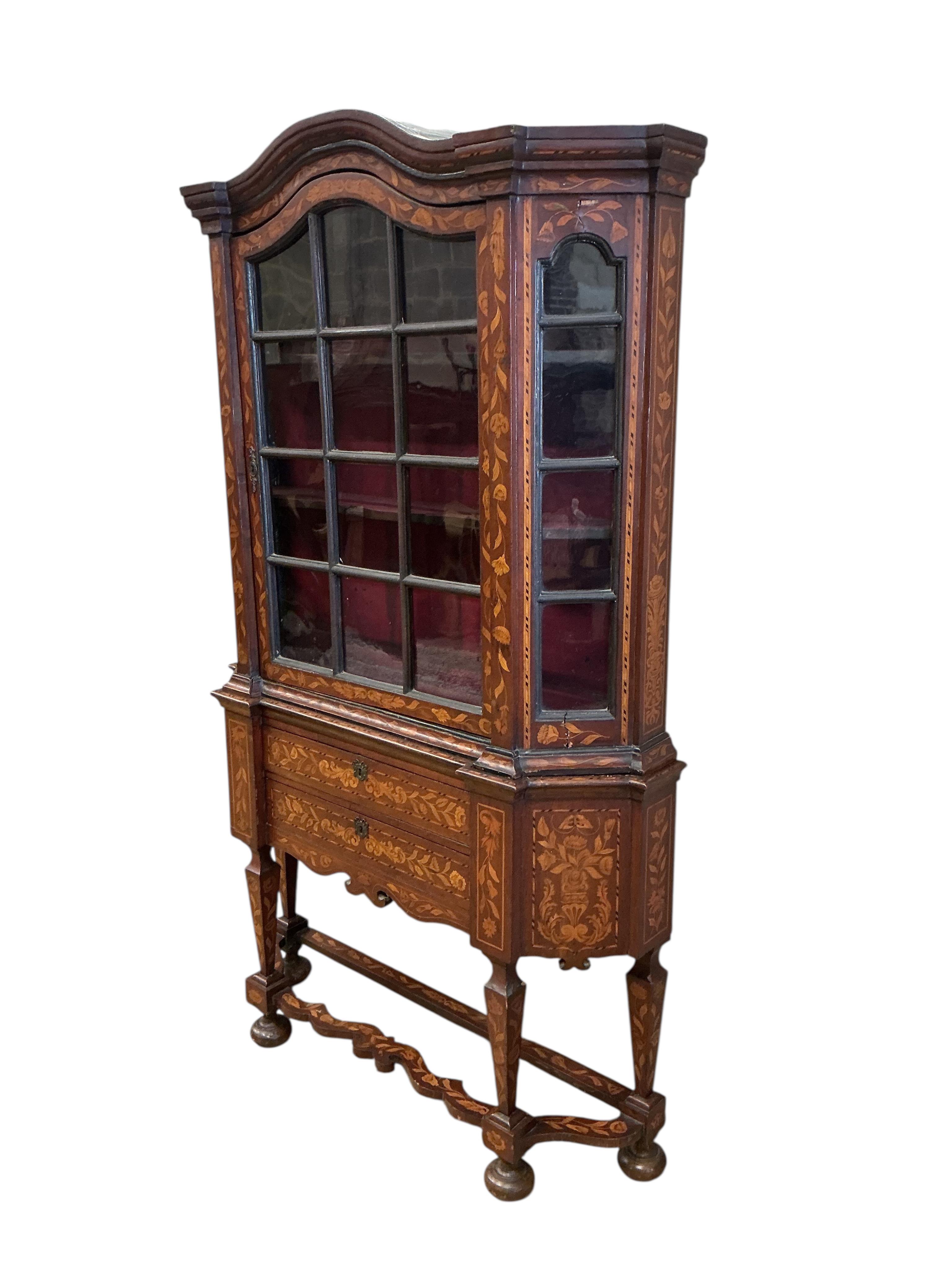 A late 18th / early 19th century Dutch floral marquetry walnut display cabinet, width 116cm, depth 30cm, height 196cm